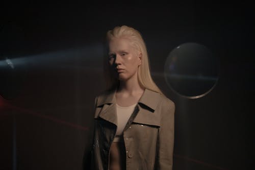Portrait of Blonde Woman in the Dark 