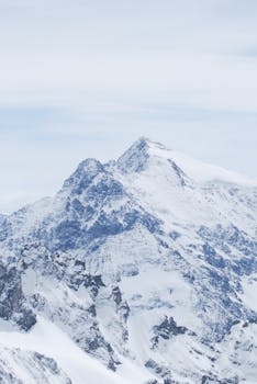 Stunning view of snowy mountain peaks captured in winter. Perfect for nature lovers.