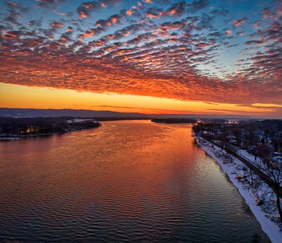 A breathtaking aerial shot of the Mississippi River at sunrise in Wabasha, MN.