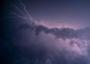 A Streak of Lightning Behind Dark Clouds