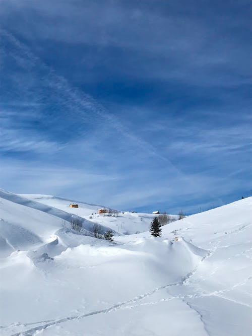 White Snow Covered Mountain Under Blue Sky