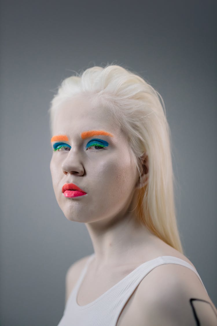 Woman With Make Up Wearing White Undershirt