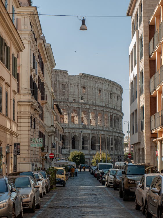 Parked Cars on a Street Towards the Colosseum