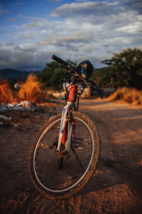 A Parked Mountain Bike on an Unpaved Road