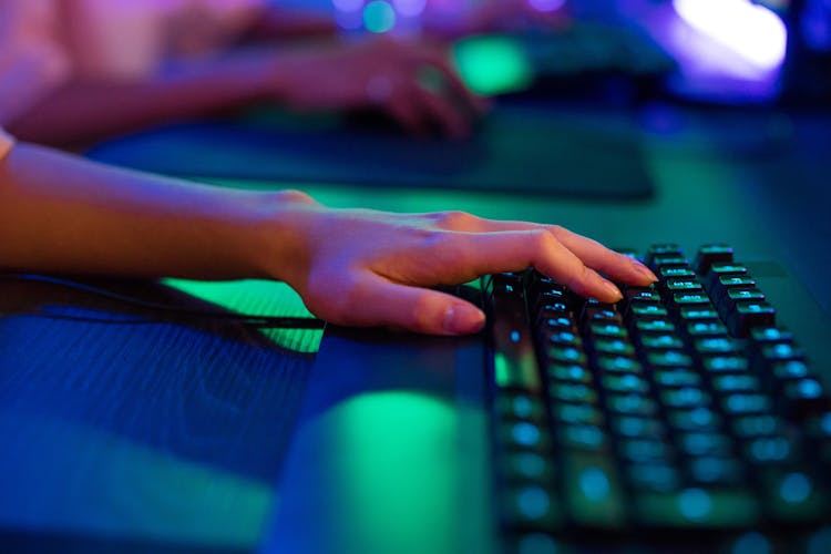 Fingers On Black Computer Keyboard