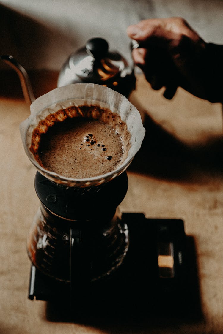 White Coffee Filter With Brown Liquid