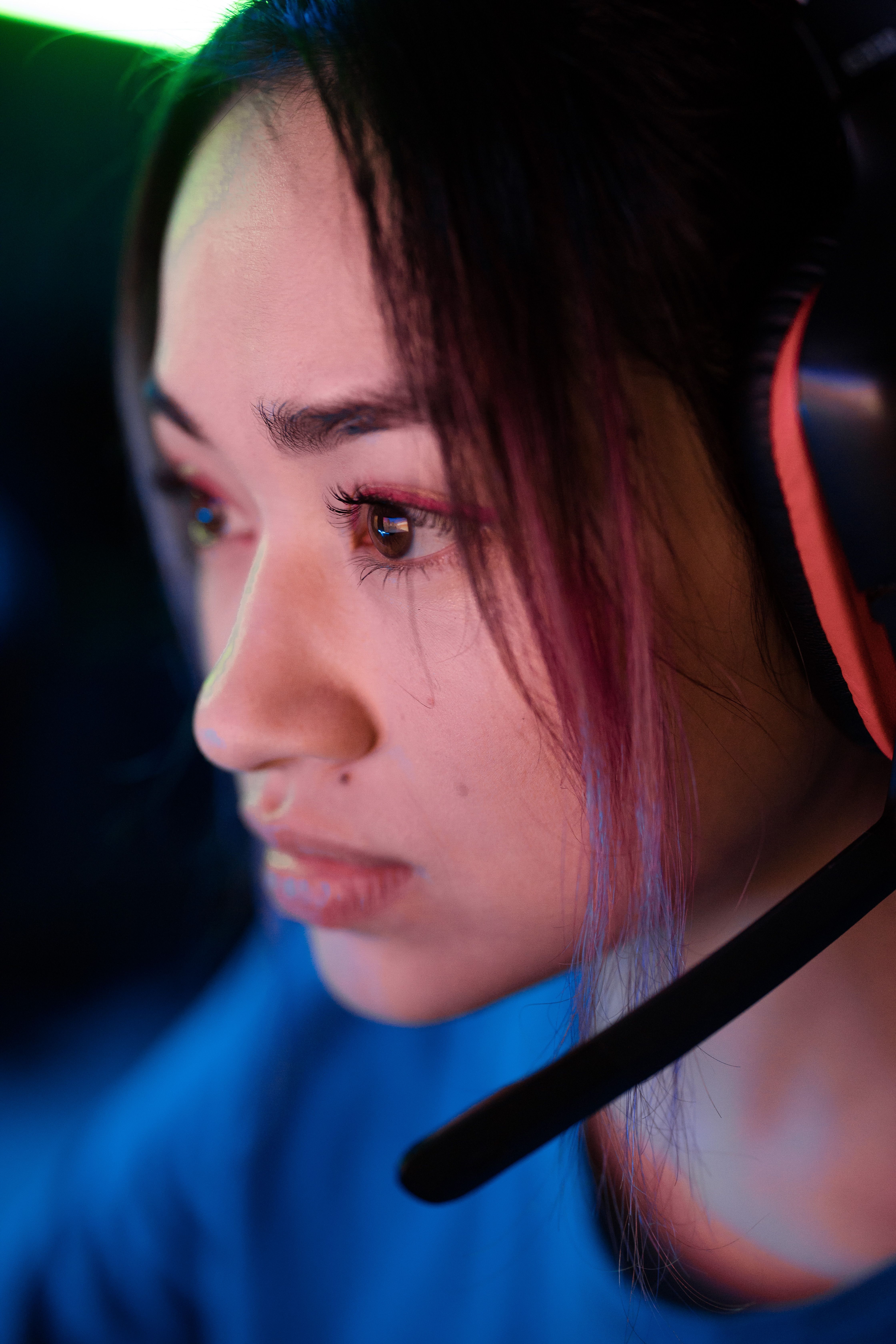Mirai, controller player for Nova Syndicate, seated at a monitor mid round