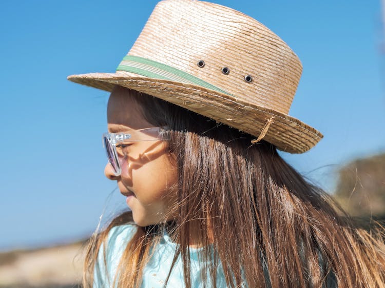 Girl Wearing A Sunhat