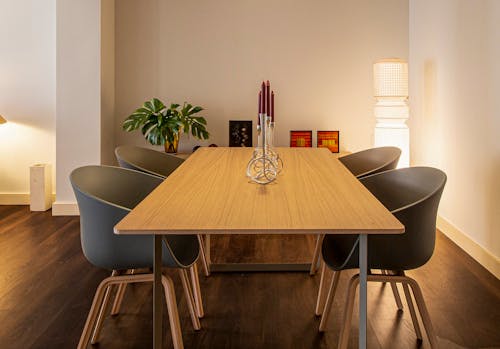 Brown Wooden Table With Gray Chairs 