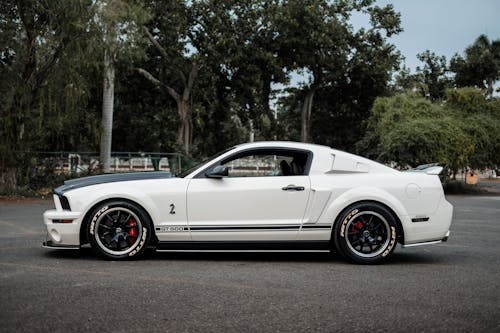 White Ford Mustang GT Parked on Road