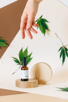 Stylish CBD oil product shot with cannabis leaves, ideal for wellness themes.