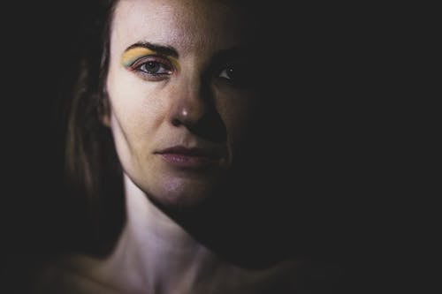 Free A Portrait of a Woman with Eye Makeup Stock Photo