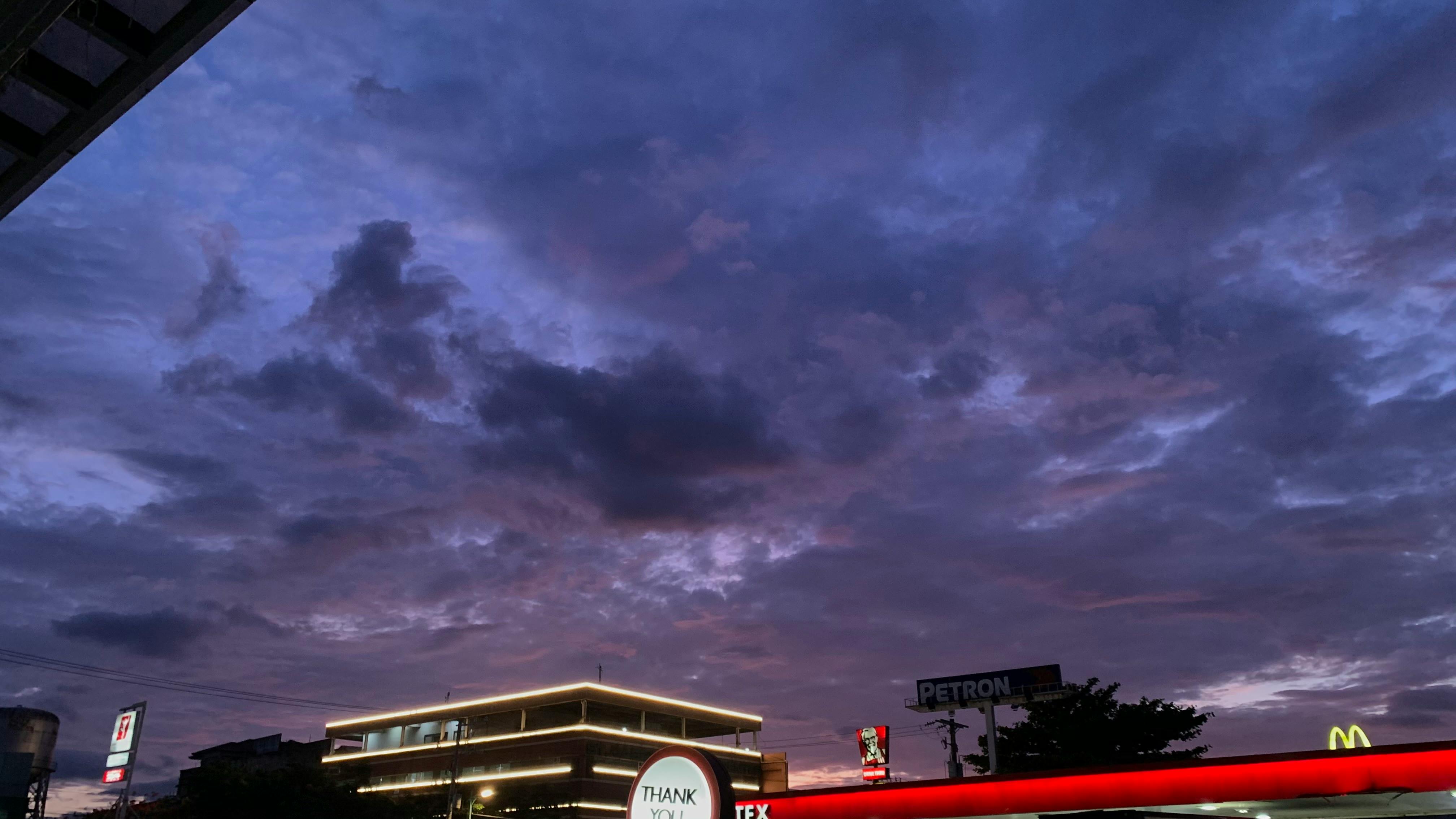 Person reading a science fiction novel with miniatures on a table