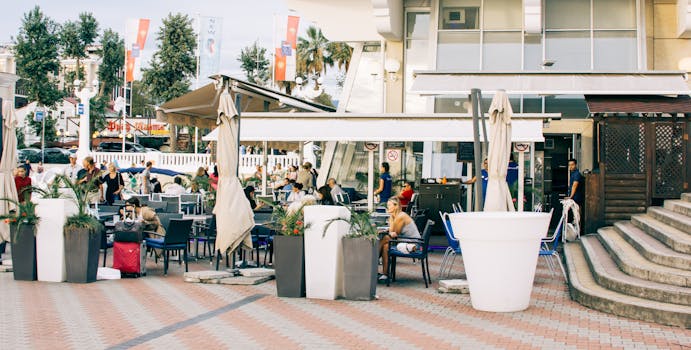 White Ceramic Pot Near Brown Parasol