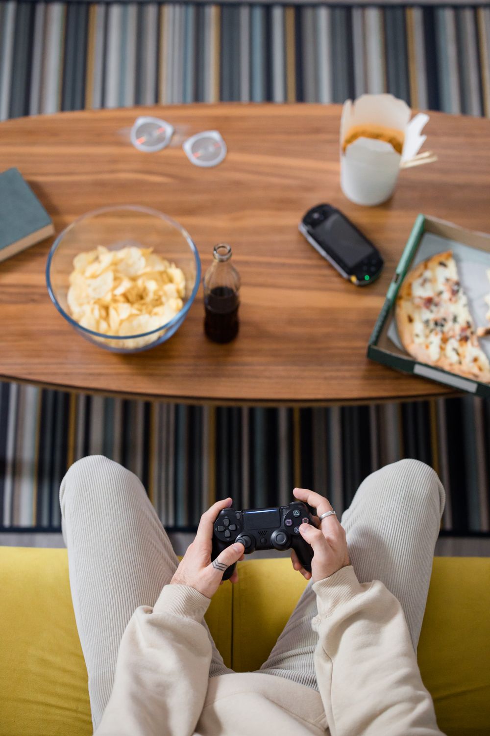 Person Using Game Controller A Person Holding Black Game Controller · Free Stock Photo