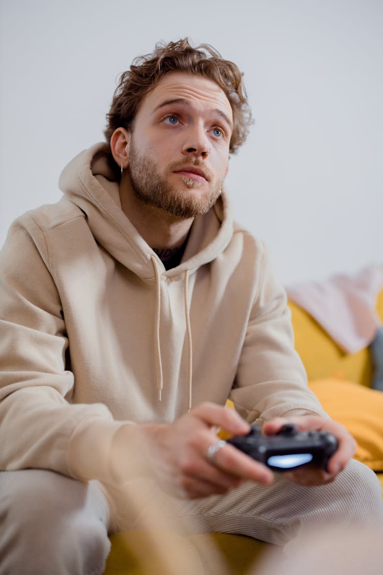 A Man In Beige Hoodie