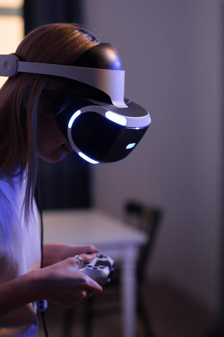  A Person Wearing Playstation VR Glasses 