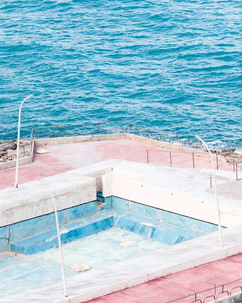 Empty Swimming Pool by the Sea 