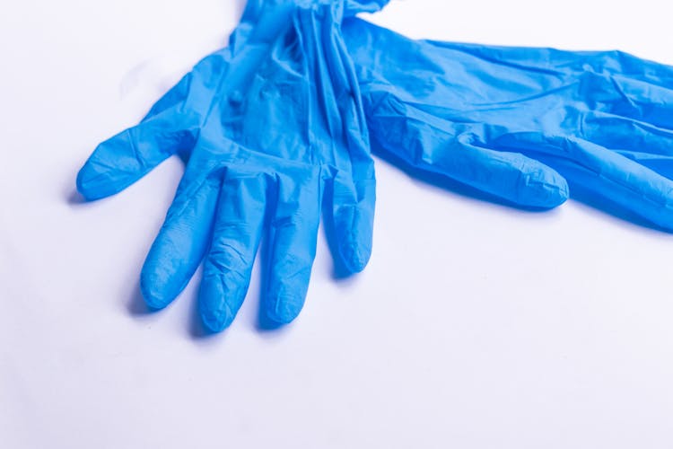 Medical Gloves On White Surface