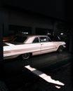 White Coupe Parked on Parking Lot