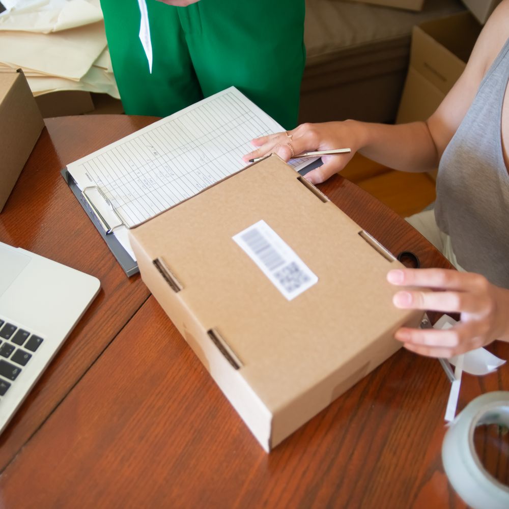 Cherry Burton — professional packers wrapping and boxing belongings