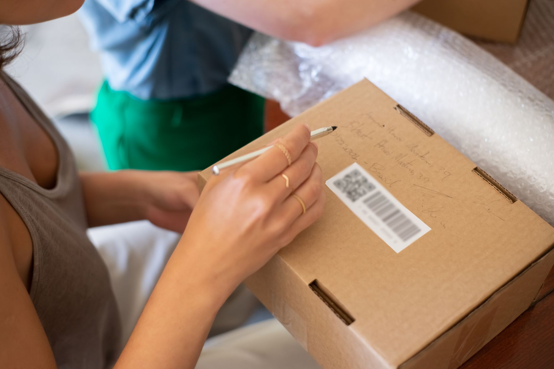 cardboard boxes with bubble wrap and foam packaging materials in a logistics setting