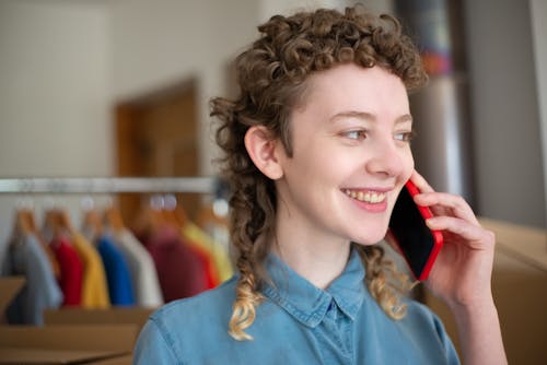 Free Close-up of a Happy Woman in a Phone Call Stock Photo