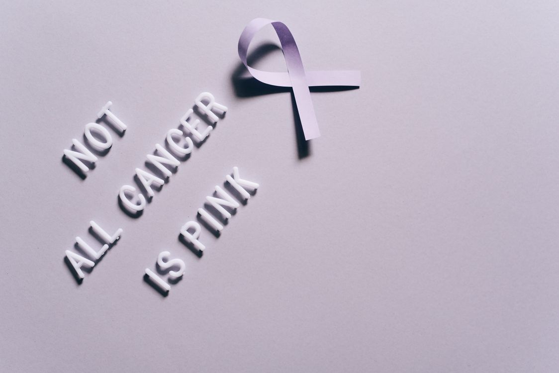 Text and a Ribbon Forming a Cancer Awareness Sign · Free Stock Photo