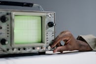 A Person Holding a Electronic Device