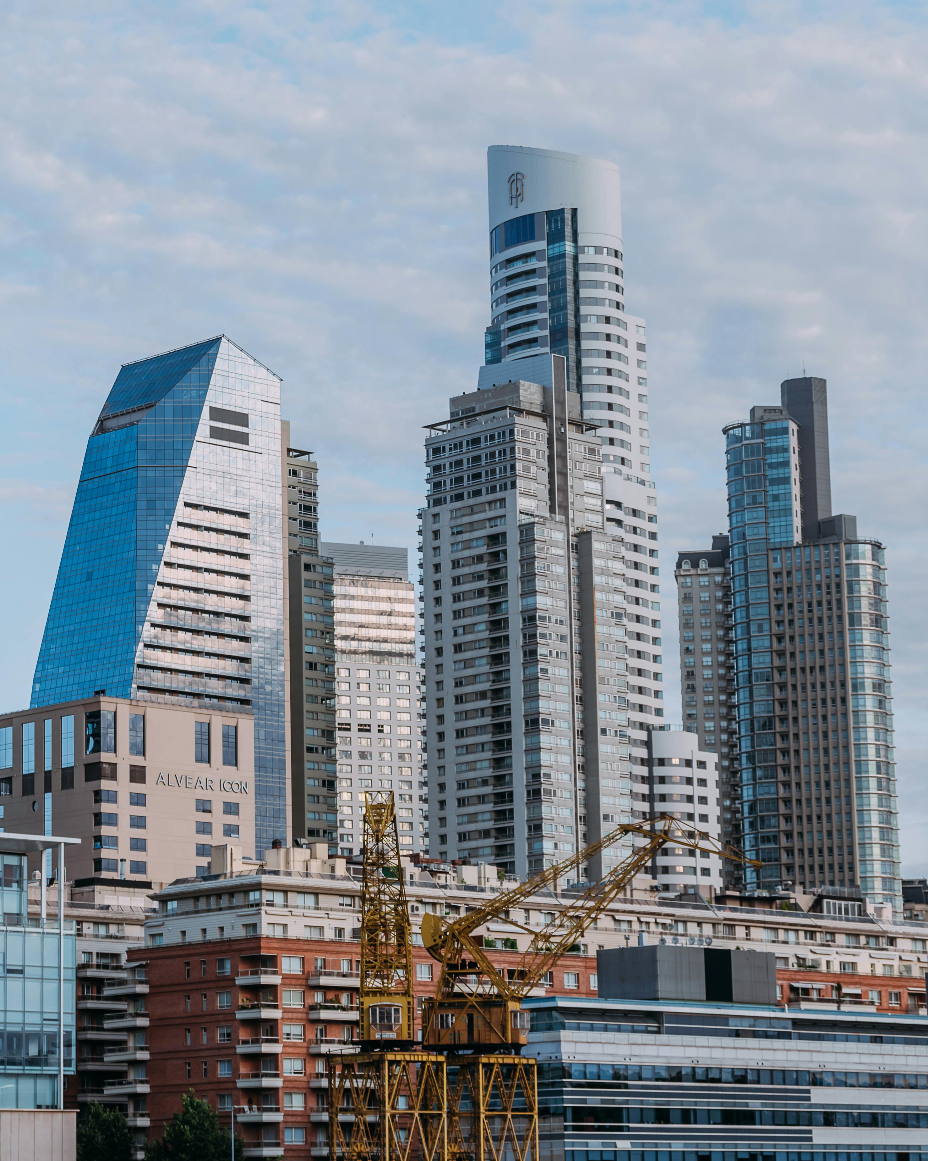 tall buildings under cloudy sky