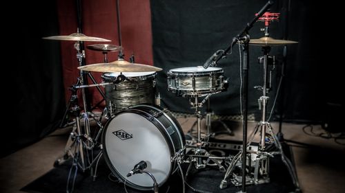 Free High-quality image of a professional drum kit setup in a recording studio. Stock Photo