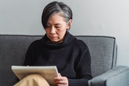 Woman Drawing an Artwork in a Sketchpad