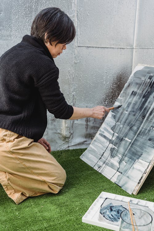 Woman Painting an Artwork