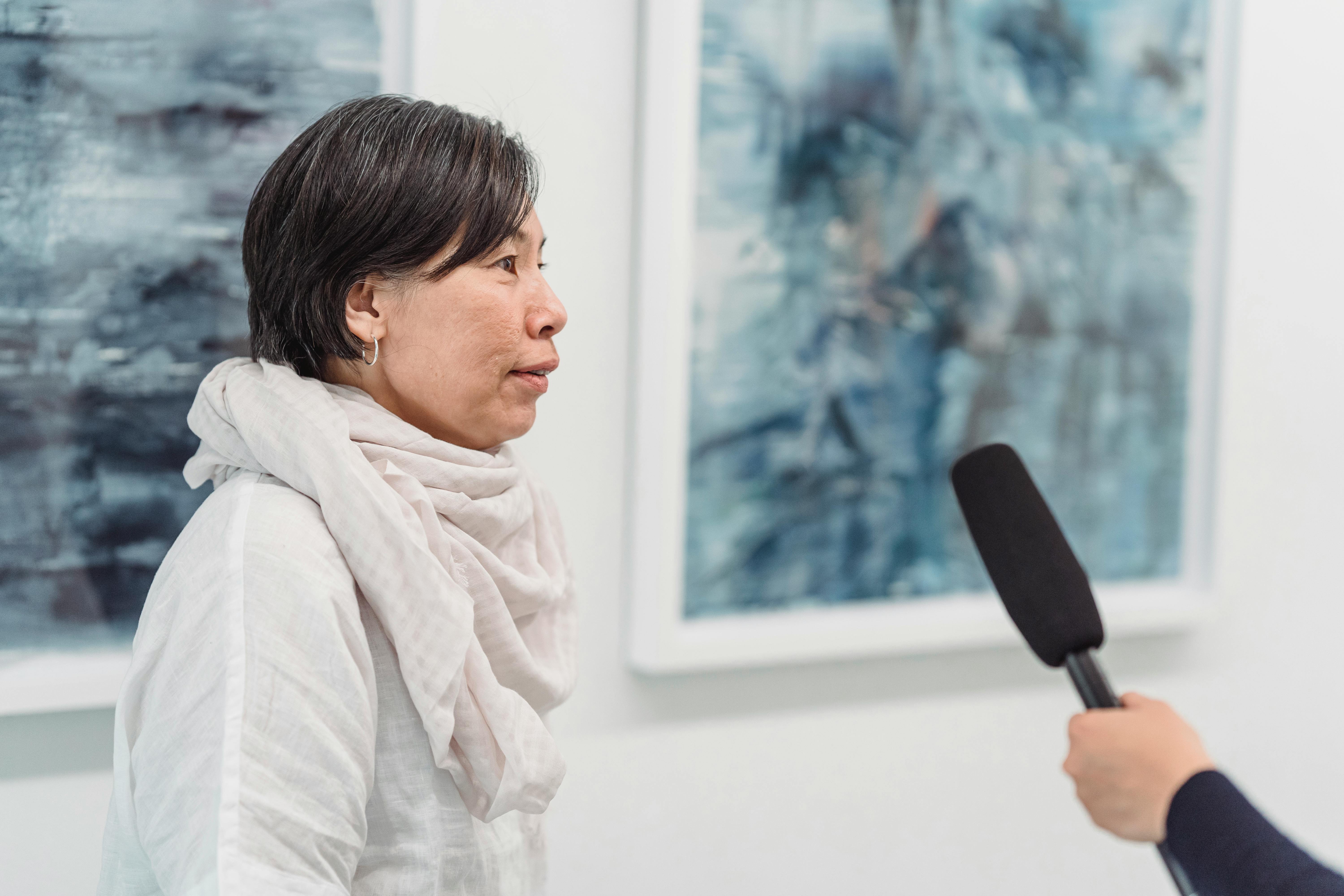a woman being interviewed