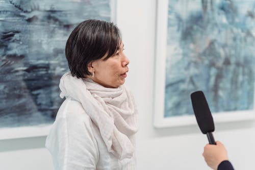 Free A Woman Being Interviewed Stock Photo