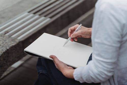 Person Drawing an Artwork