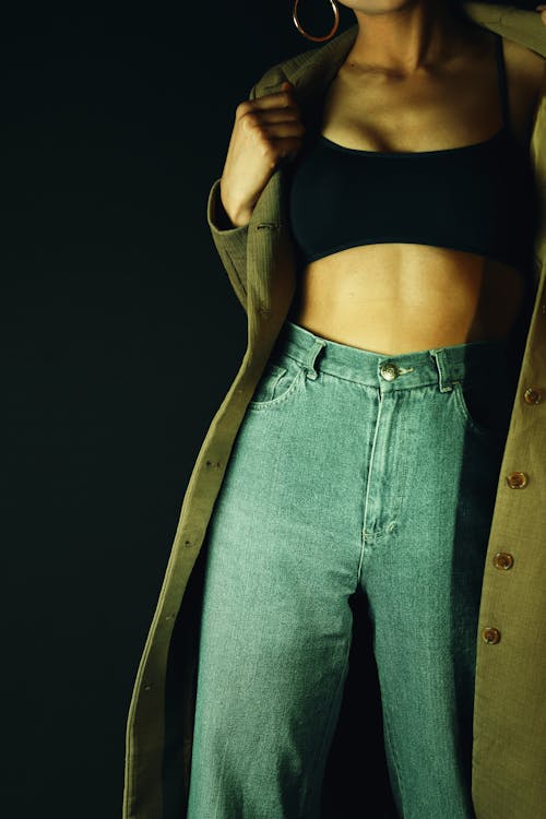 Free A Woman in Black Bralette and Denim Jeans Stock Photo