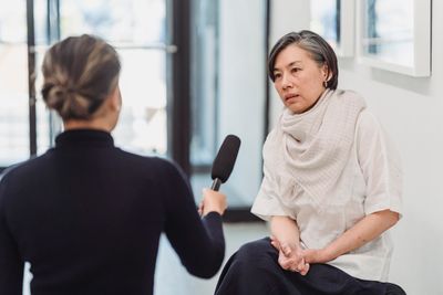 Presenter in an office by Greta Hoffman on Pexels
