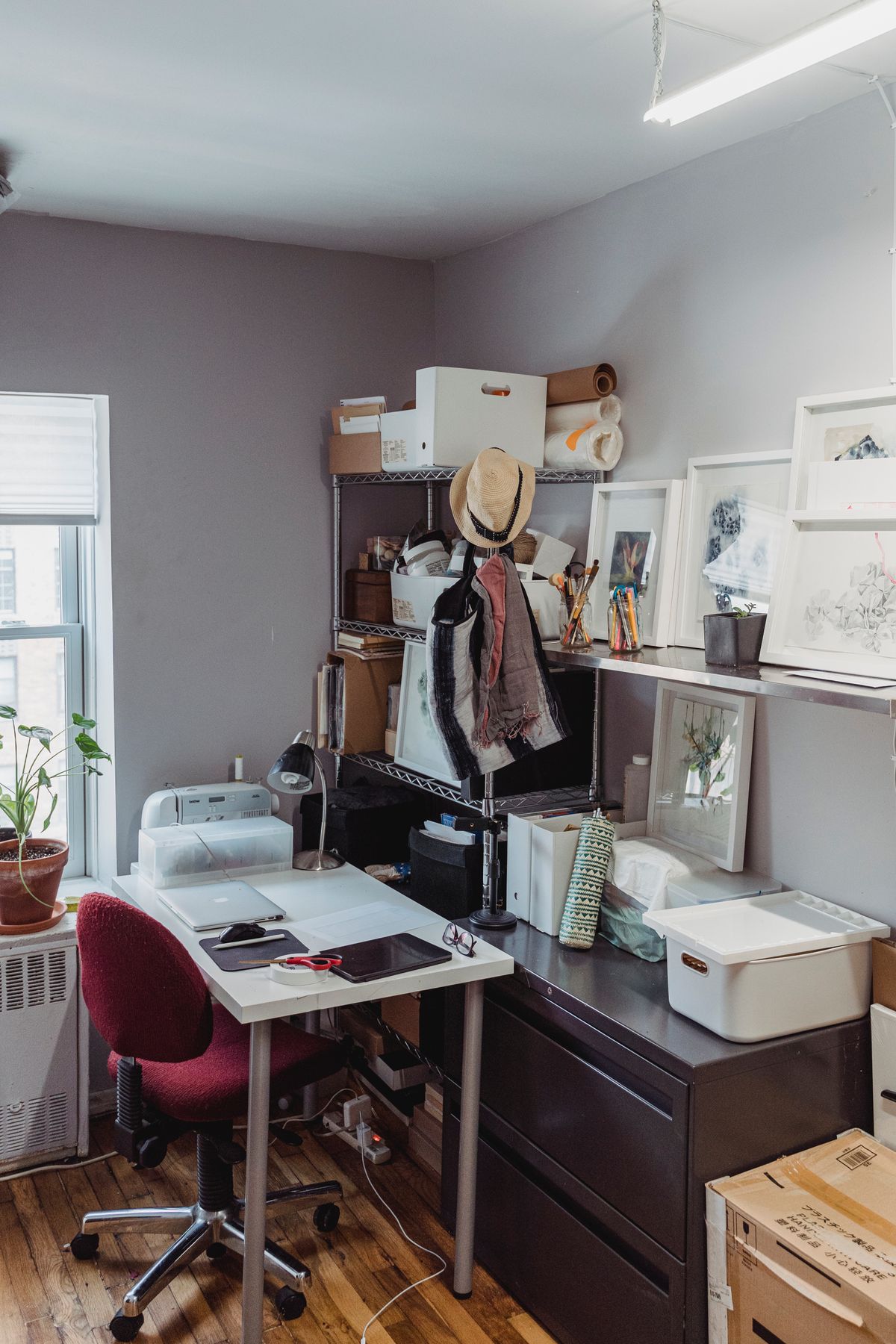 Compact home office workspace with desk and storage