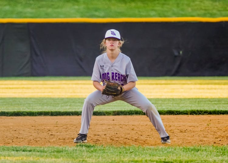 Athlete Girl In A Baseball Field