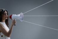 A Woman Holding a Megaphone