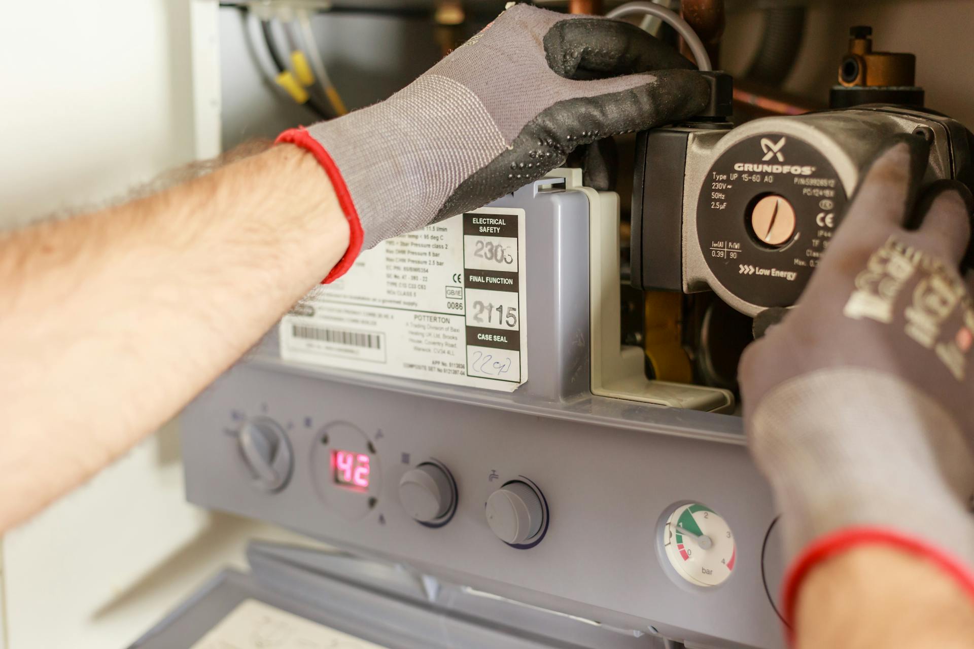 Plumber Repairing Power Source