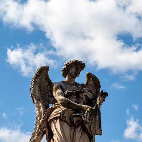 Low-Angle Shot of an Angel Statue 