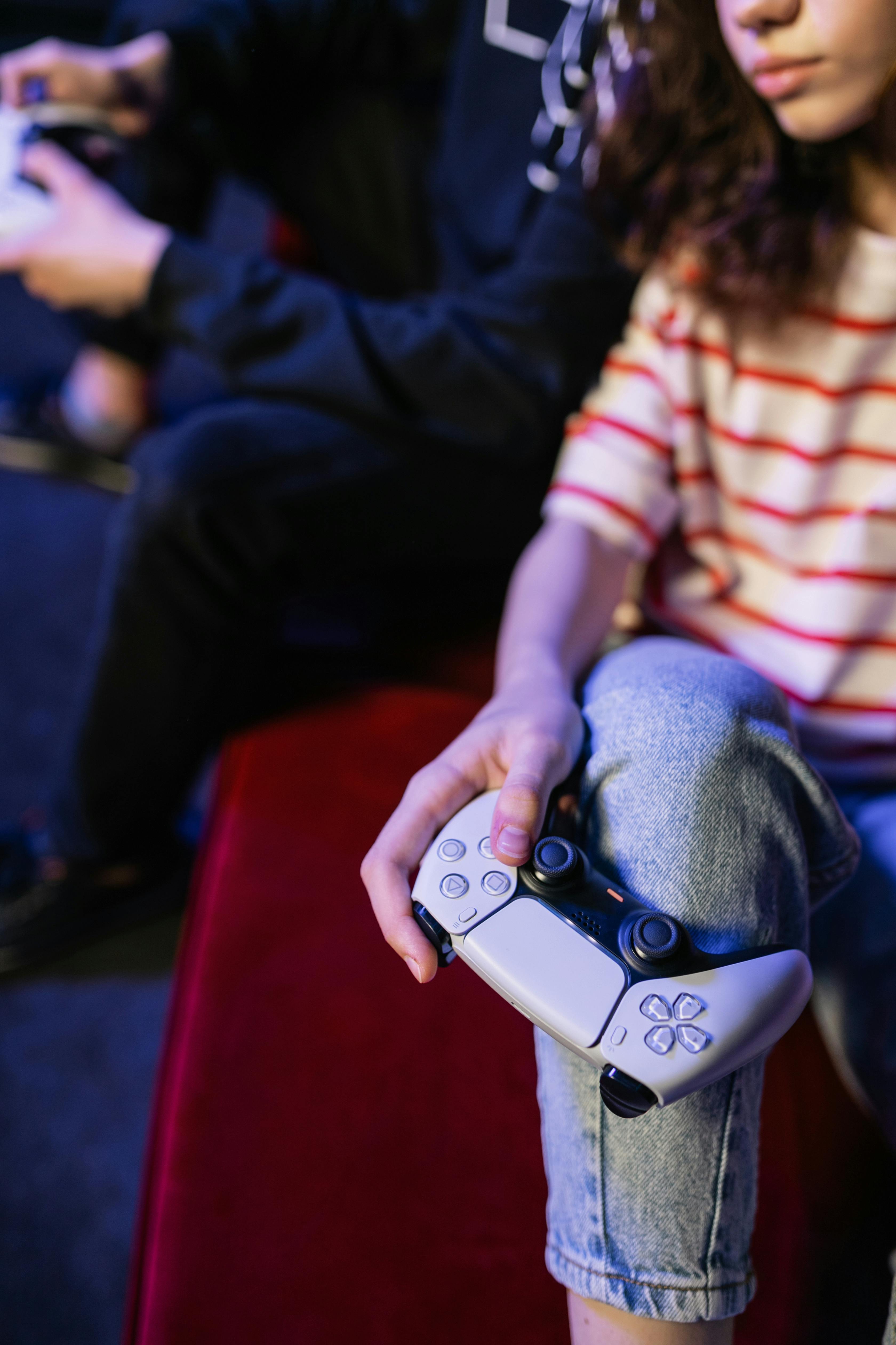 woman holding a video game controller