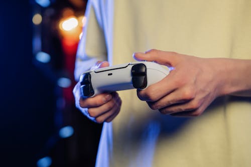 Foto profissional grátis de consola de jogos, gamer, holding