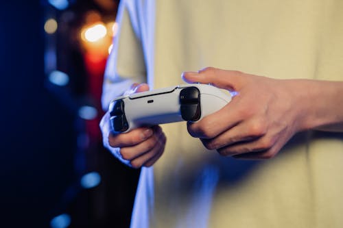 A Person Holding a Game Controller