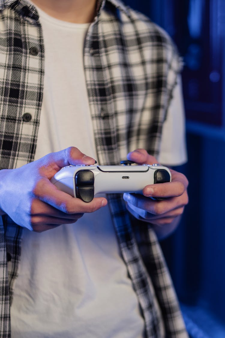 Person Holding A White Controller