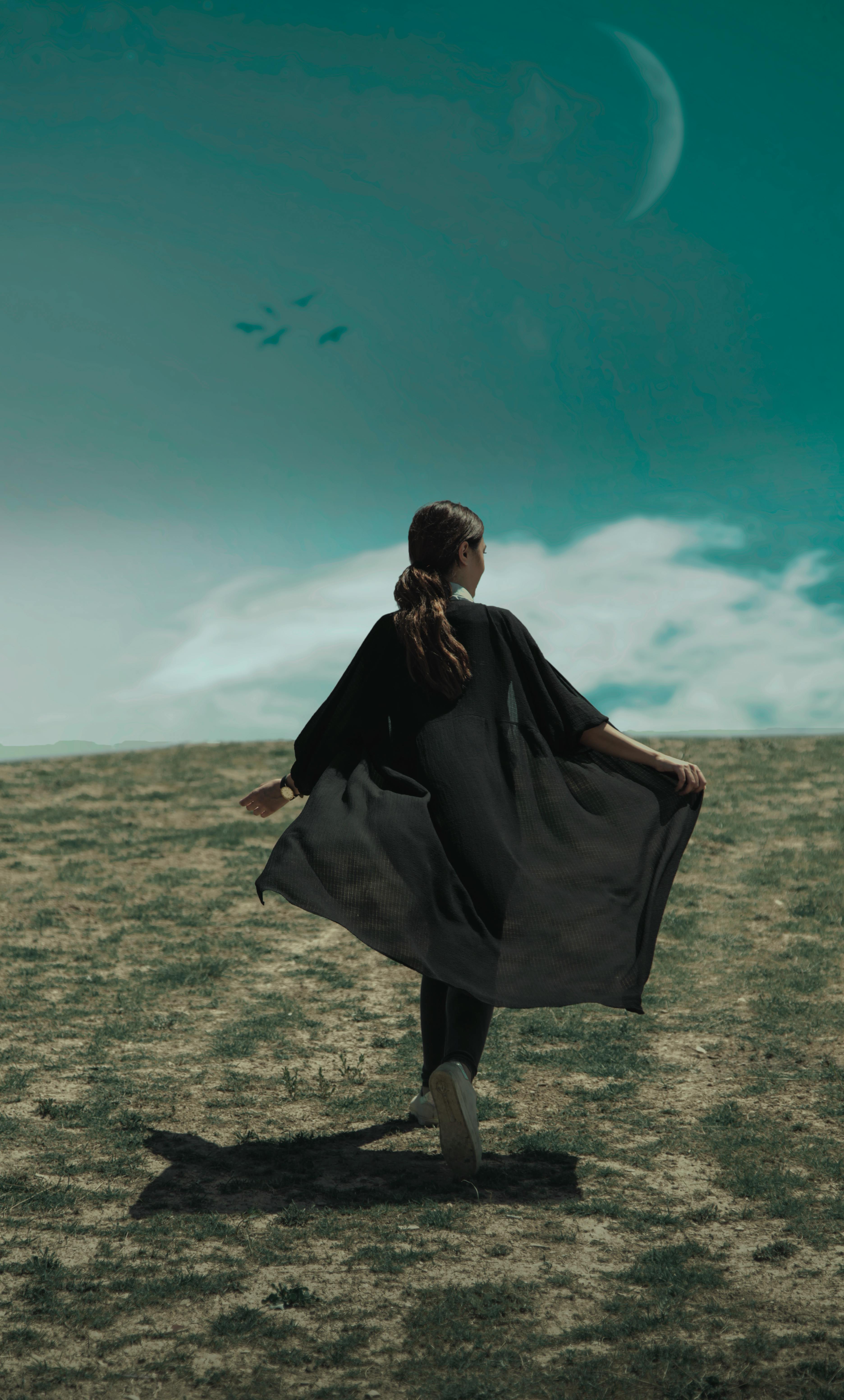 E-sports casters and analysts at a broadcast desk with bright lighting and screens