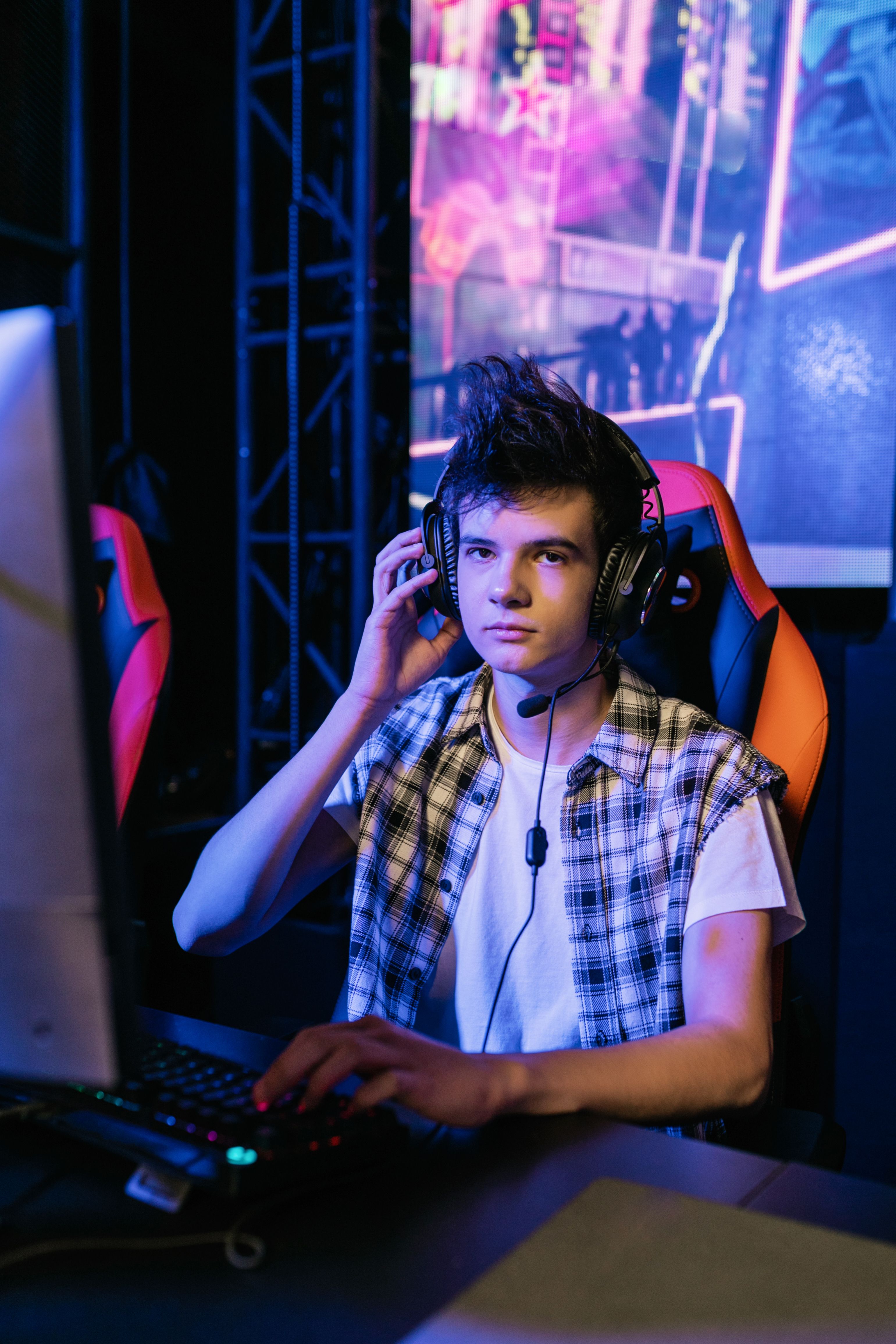 Man with Black Headphones Playing Computer Games · Free Stock Photo