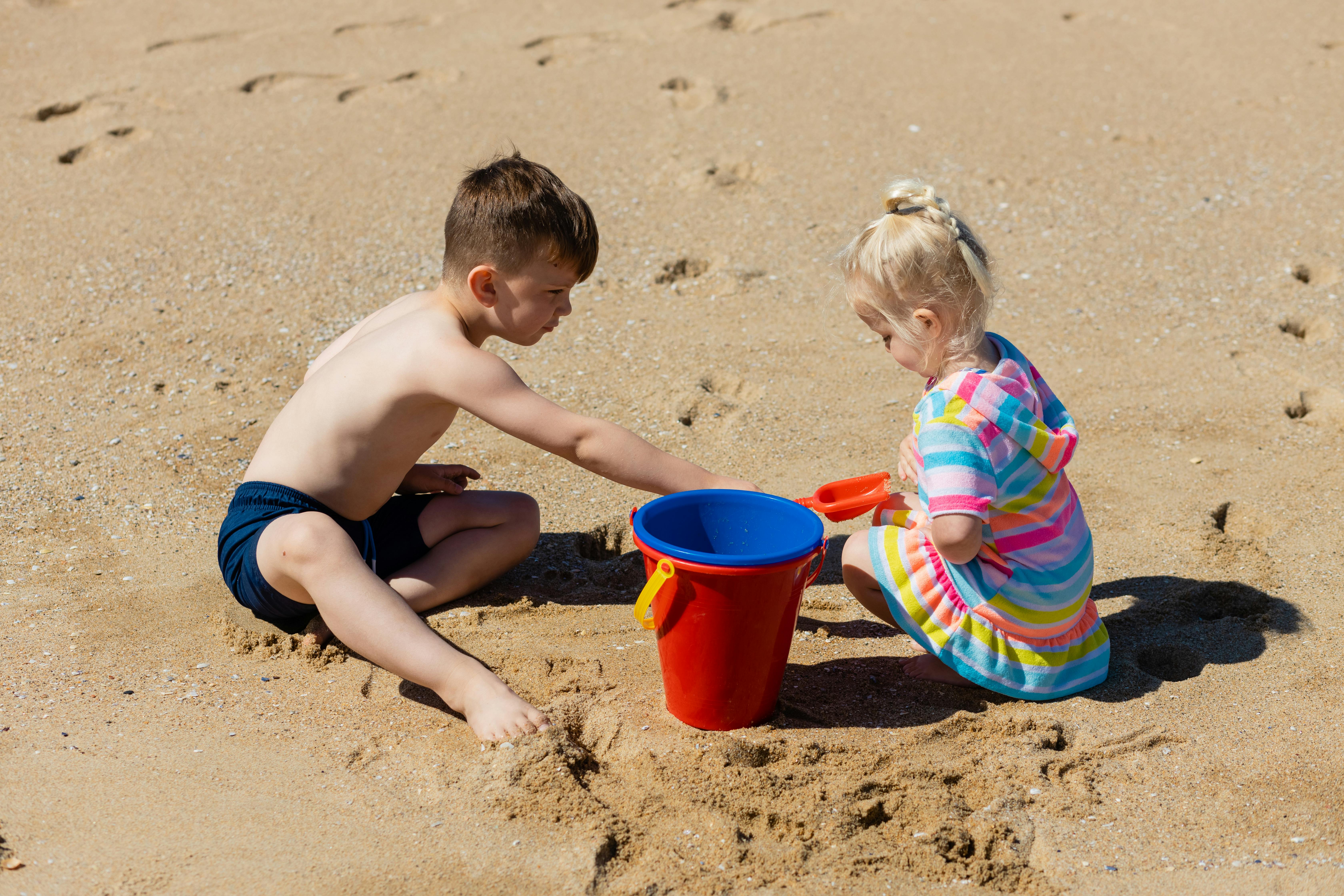 children playing on the beach